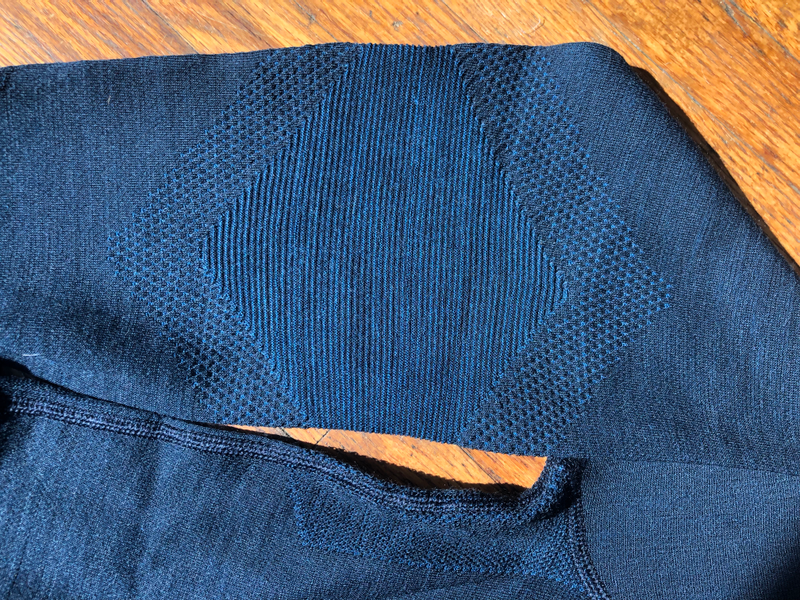 Pictured: A mesh armpit zone, and a reinforced elbow, no extra panels required.